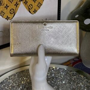 EUC Kate Spade Metallic Cameron Street Wallet, in gold metallic finish.